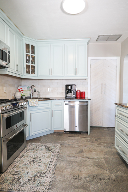 view of blue painted kitchen cabinets  with Silver Sage paint color in Urethane paint 