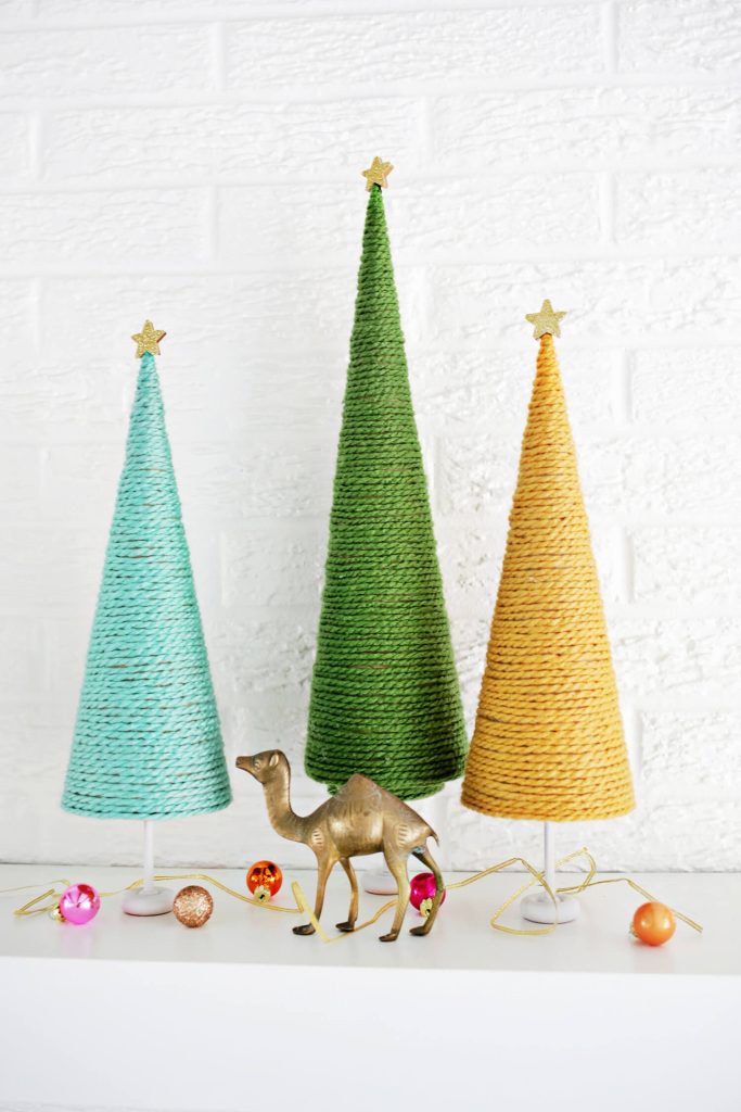 Yarn Christmas trees in light blue, green and yellow